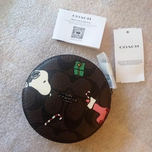 Coach Handbags - NWT COACH X Peanuts Round Coin Case In Signature Canvas With Snoopy Presents